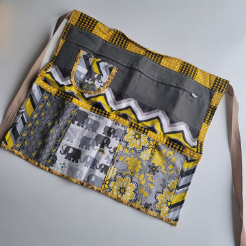 Yellow, white and gray apron front.