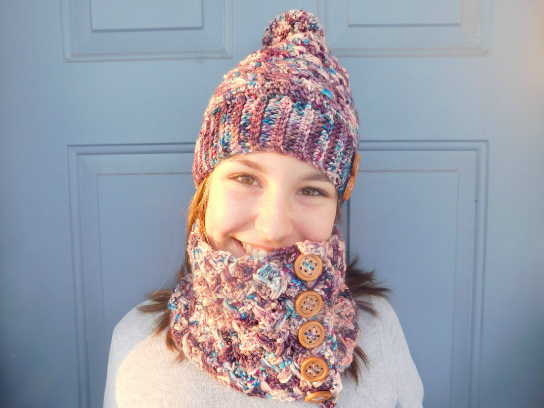 Aurora-Borealis-Crochet Hat and Cowl worn by teenager against blue door.