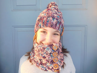 Aurora-Borealis-Crochet Hat and Cowl worn by teenager against blue door.