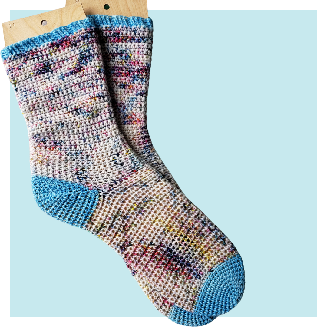Bahzeek crochet socks on turquoise background.