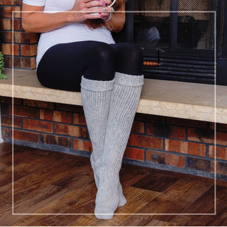 Climbing Vines Knee High Socks worn in front of fireplace.