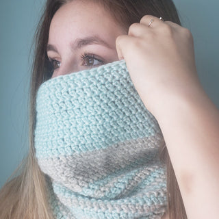Cloudy Crochet Cowl worn over young woman's face.