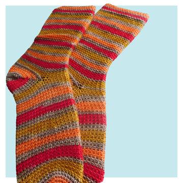 Dobby Crochet Socks on turquoise background.