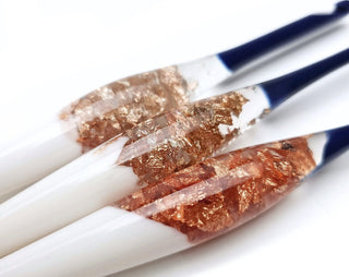 Furls Streamline Nautilus Hooks on white background.