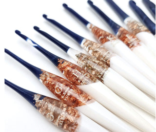 Furls Streamline Nautilus Hooks on white background.