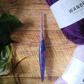 Furls Streamline Taurus Hook with accessories flatlay.