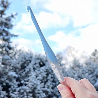 Furls Streamline Wonderland Hook on wintery background.