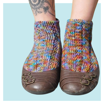 Josephine Crochet Socks on turquoise background.