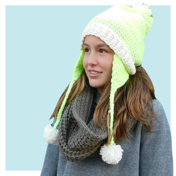 Key Lime crochet Hat worn by teen  on turquoise background.