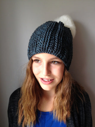 Blue Lea Cabled Crochet Hat worn by teen.