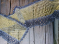 Libellule crochet stole on wood background.