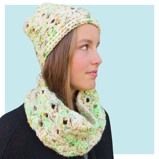 Lucky Charms Crochet Hat and Cowl worn by teen on turquoise background.