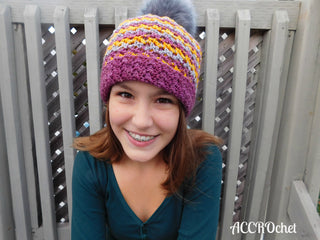 Milki crochet hat worn by teen outside.