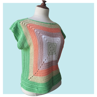 Not-So-Granny crochet tee on turquoise background.