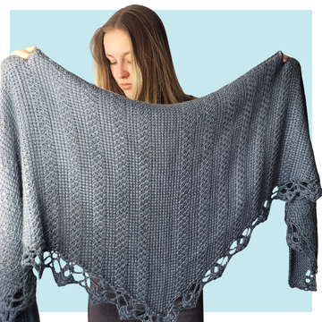 Orchard Tunisian crochet shawl on turquoise background.