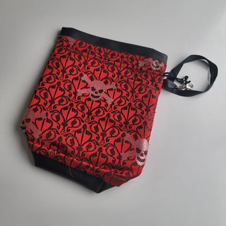 Pleather project bag, red with skulls and ornate print.