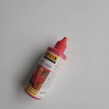 Regia Red Latex Bottle.