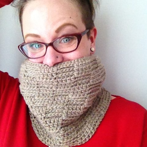 The-One-crochet cowl worn by woman wearing red shirt.