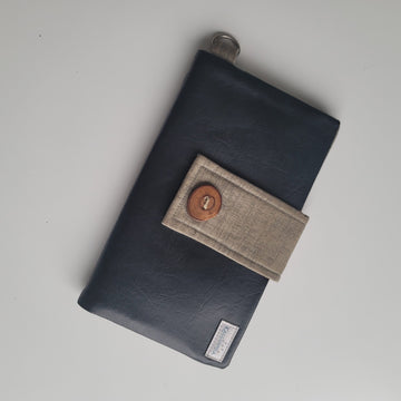 Closed leather wallet.