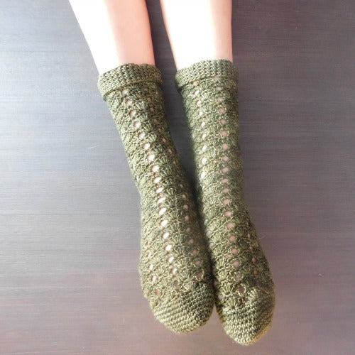 Wildlings-crochet socks on feet.