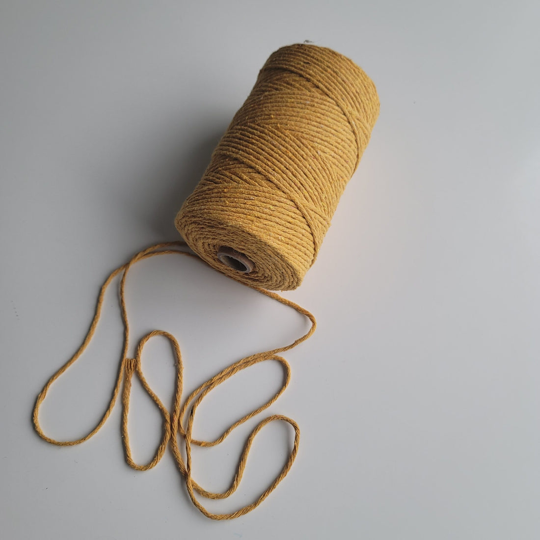 Yellow macramé cord