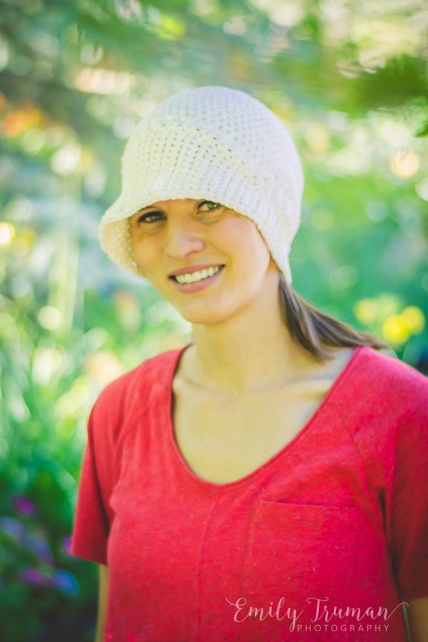 Woman wearing crochet bella sun hat image (c) Emily Truman photography.