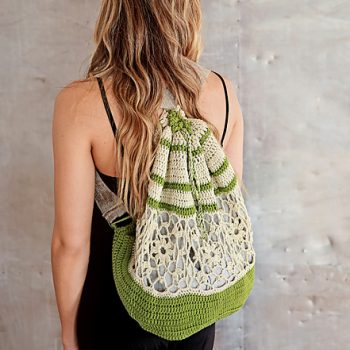 Woman with her back turned wearing crochet backpack