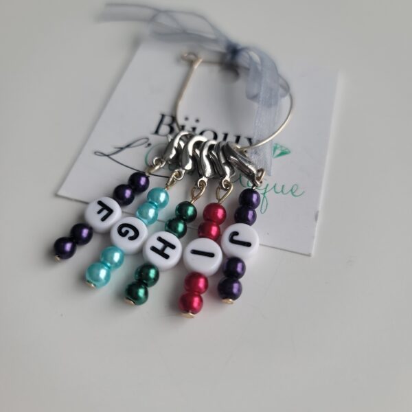 5 lettered stitch markers with colourful beads