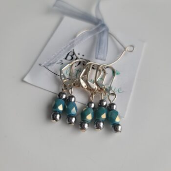 5 stitch markers with teal metal bead