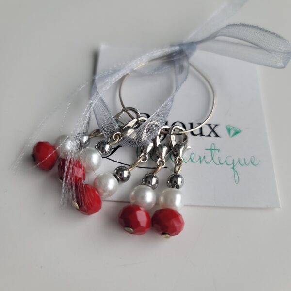 5 stitch markers with red bead and pearl