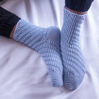 Blue Skyscraper socks laid flat